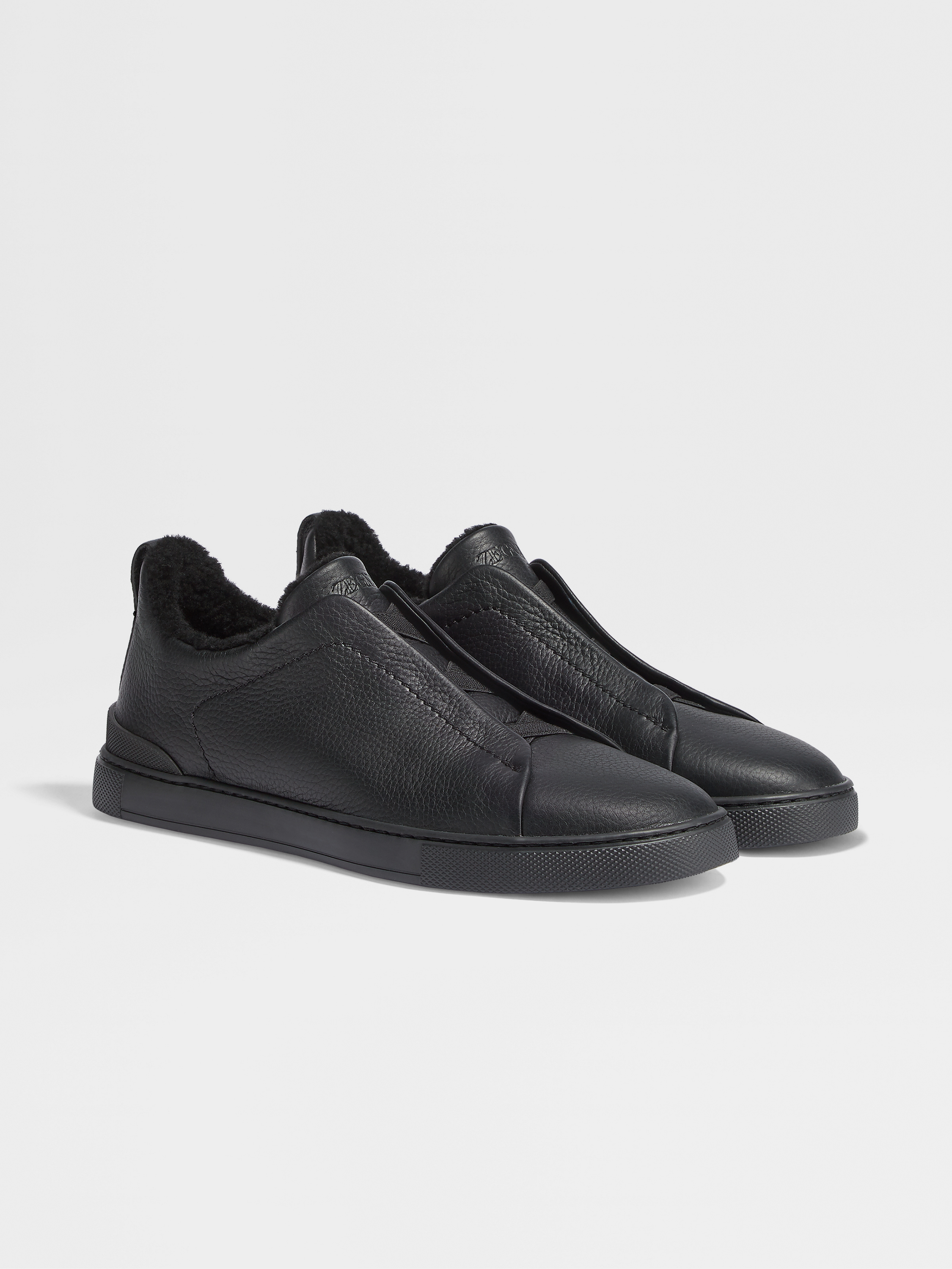 off white deerskin triple stitch sneakers