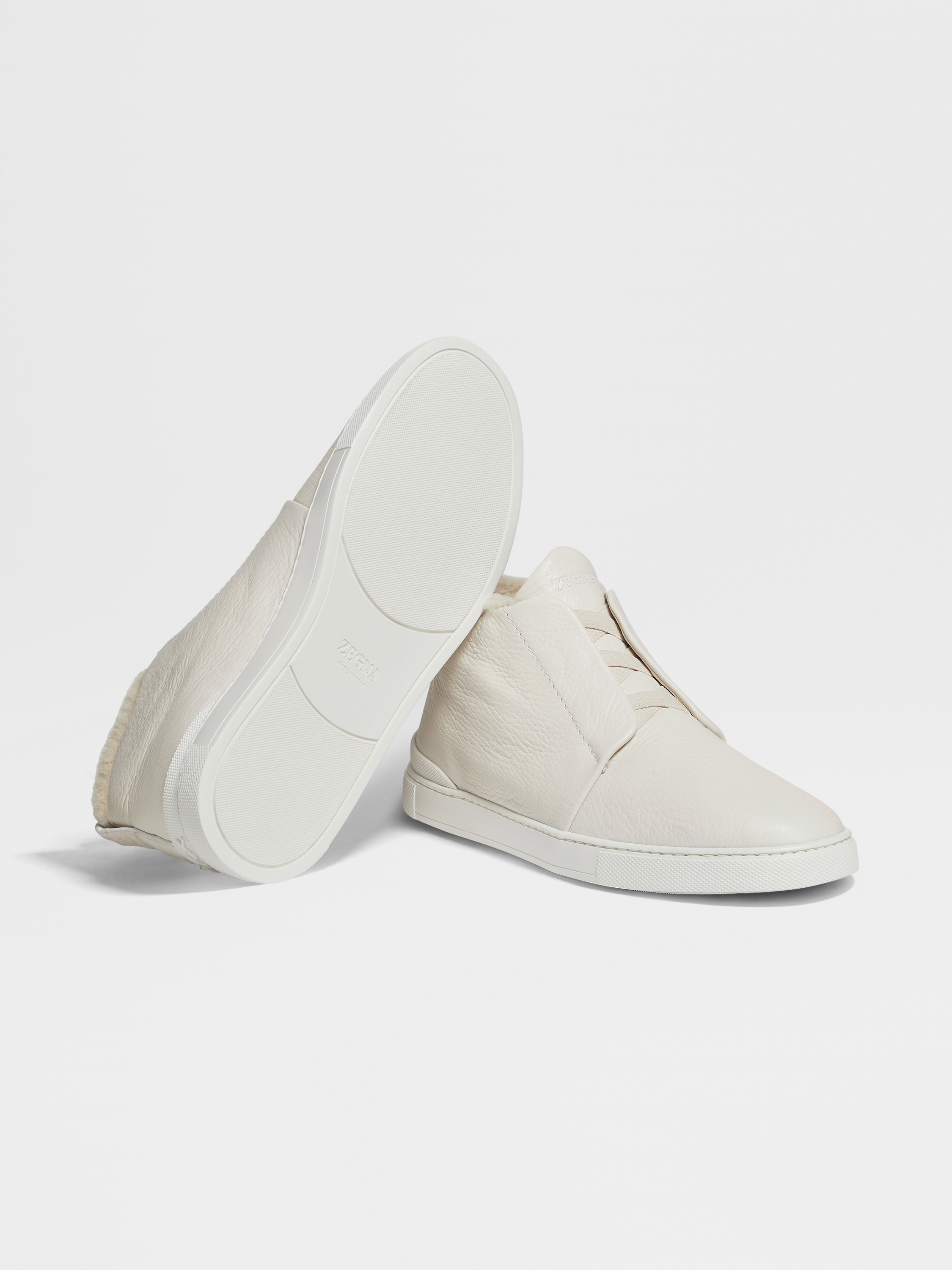 off white deerskin triple stitch sneakers