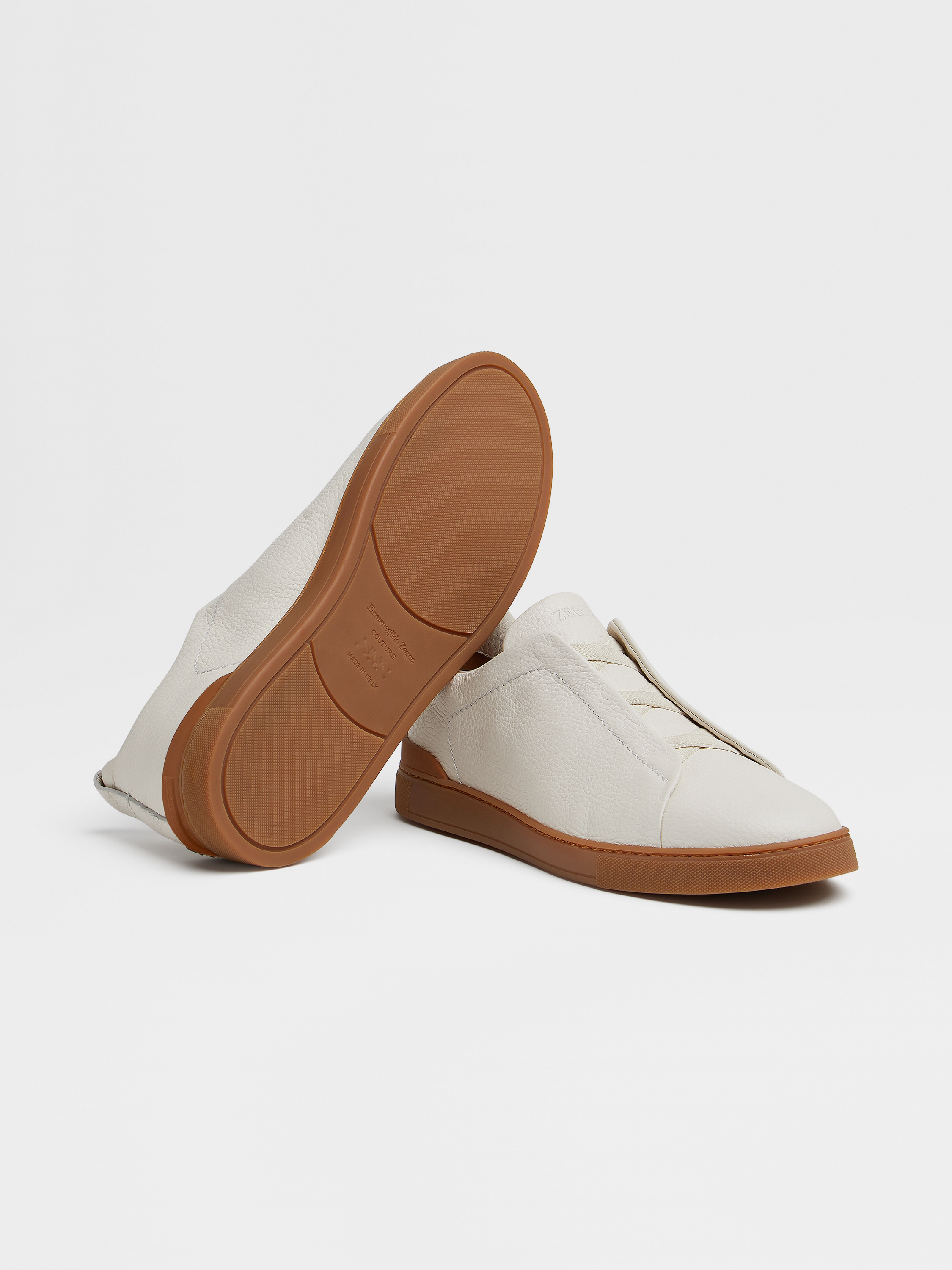 off white deerskin triple stitch sneakers