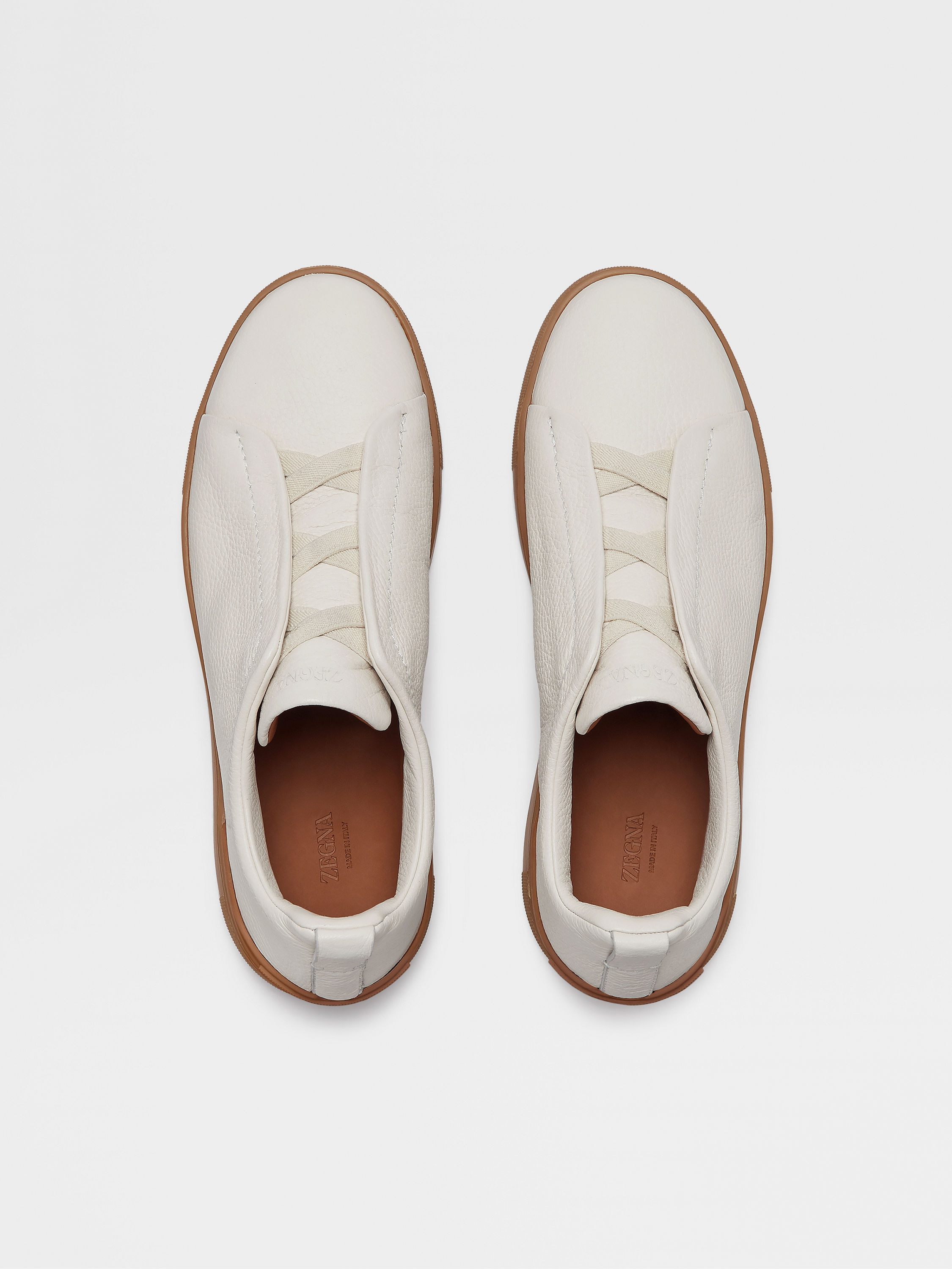 off white deerskin triple stitch sneakers
