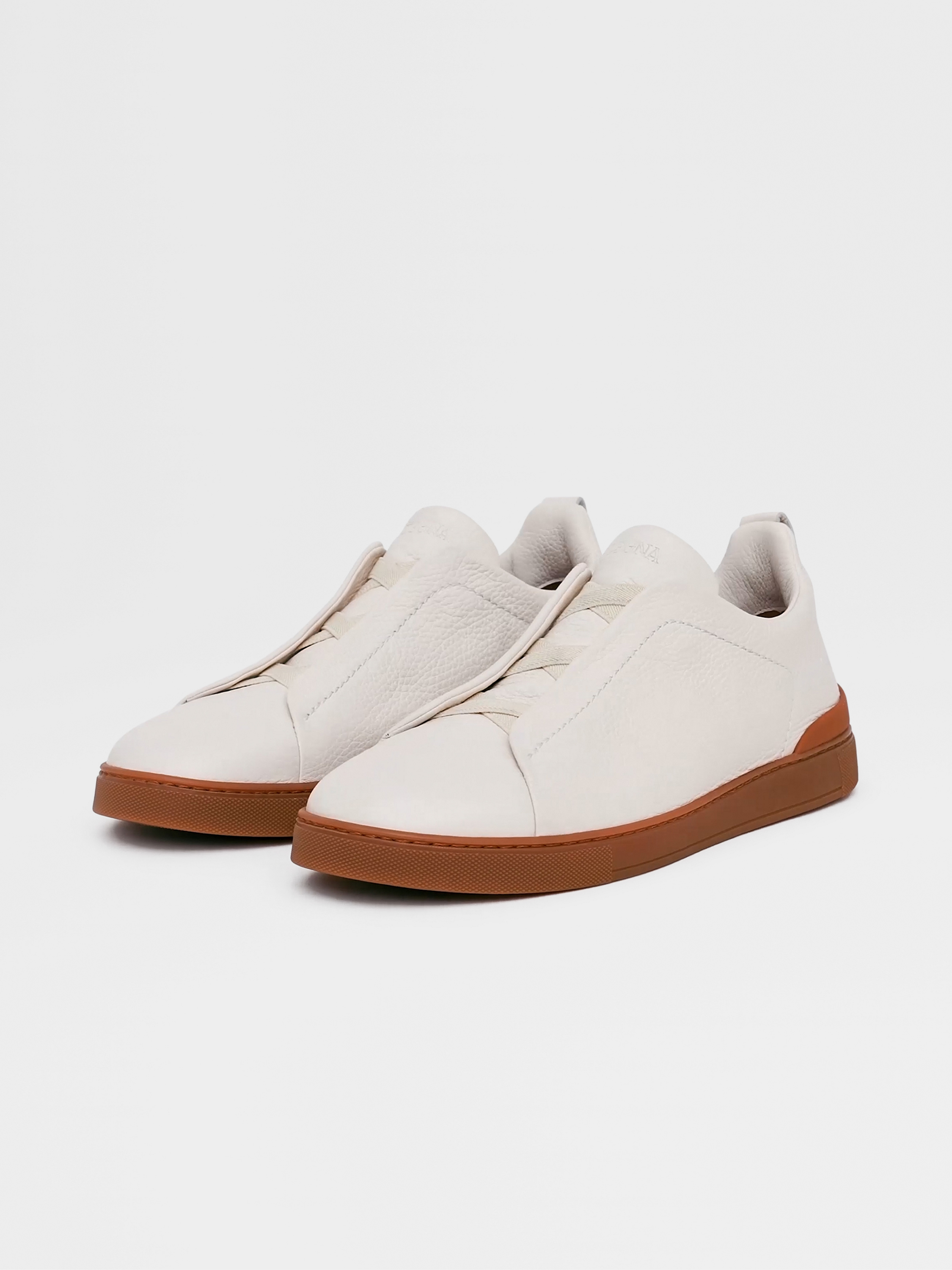 off white deerskin triple stitch sneakers