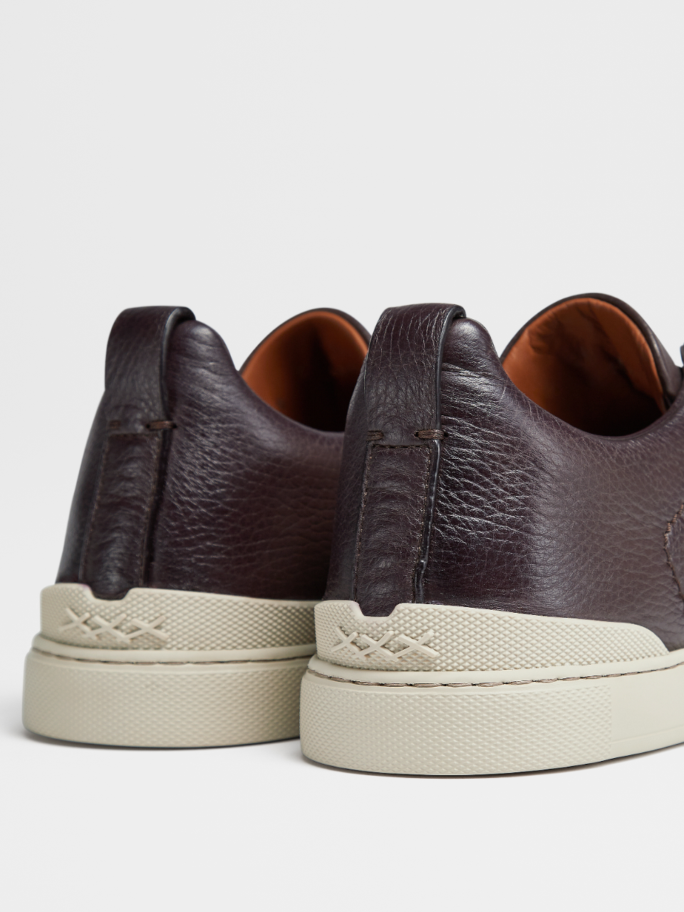 off white deerskin triple stitch sneakers