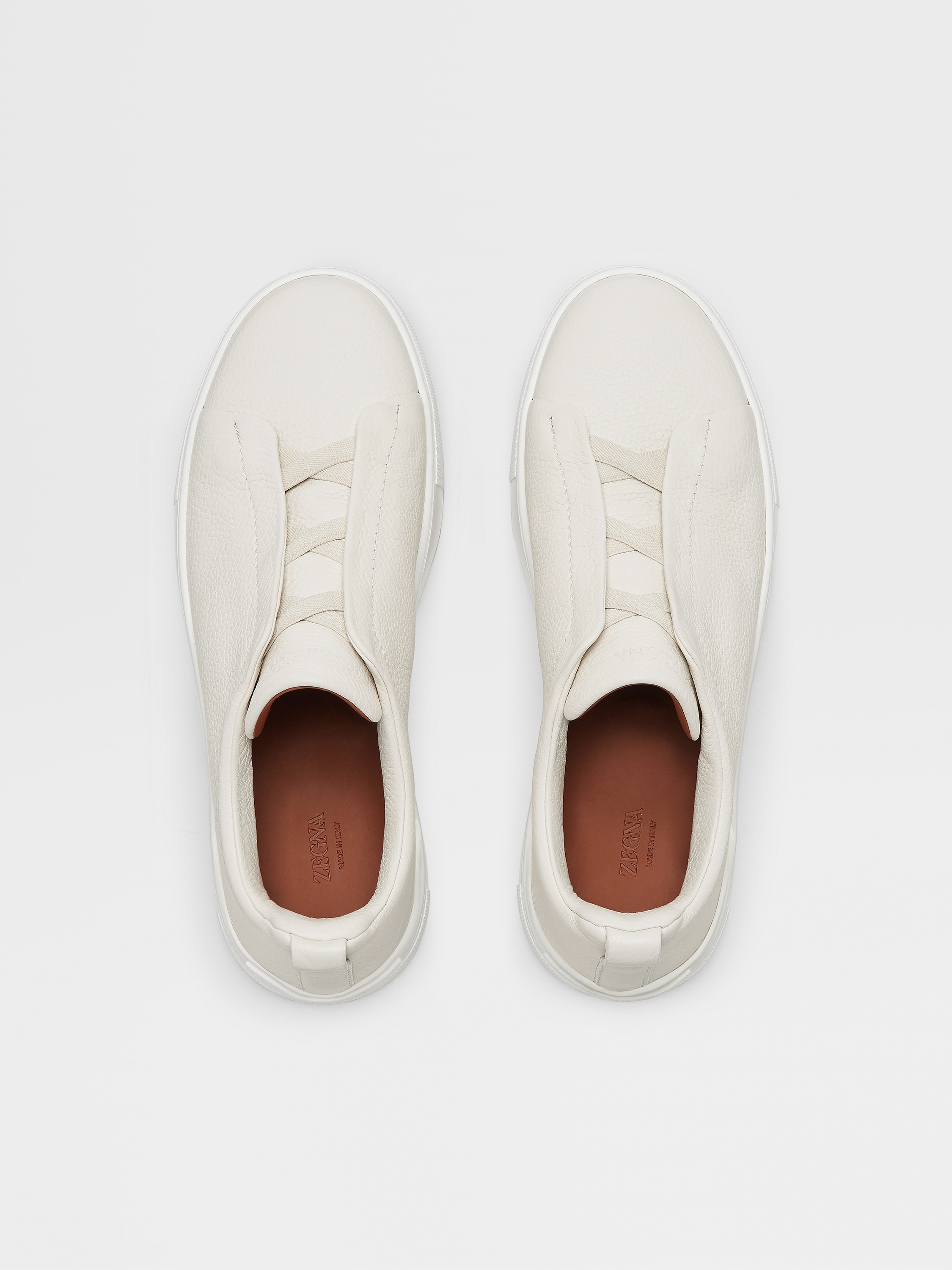 off white deerskin triple stitch sneakers