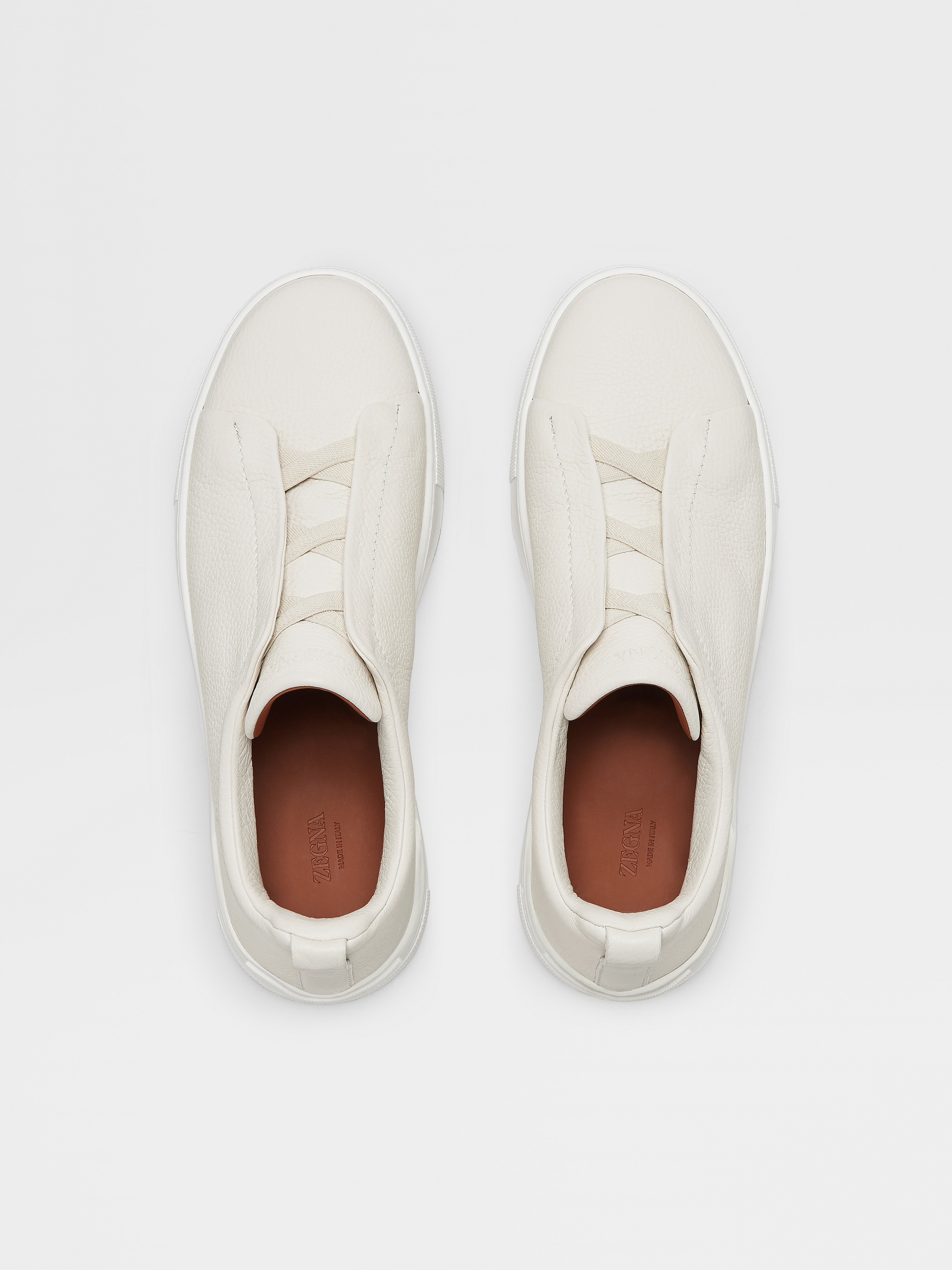 off white deerskin triple stitch sneakers