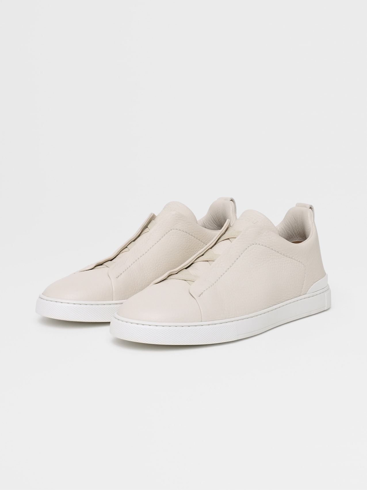 off white deerskin triple stitch sneakers