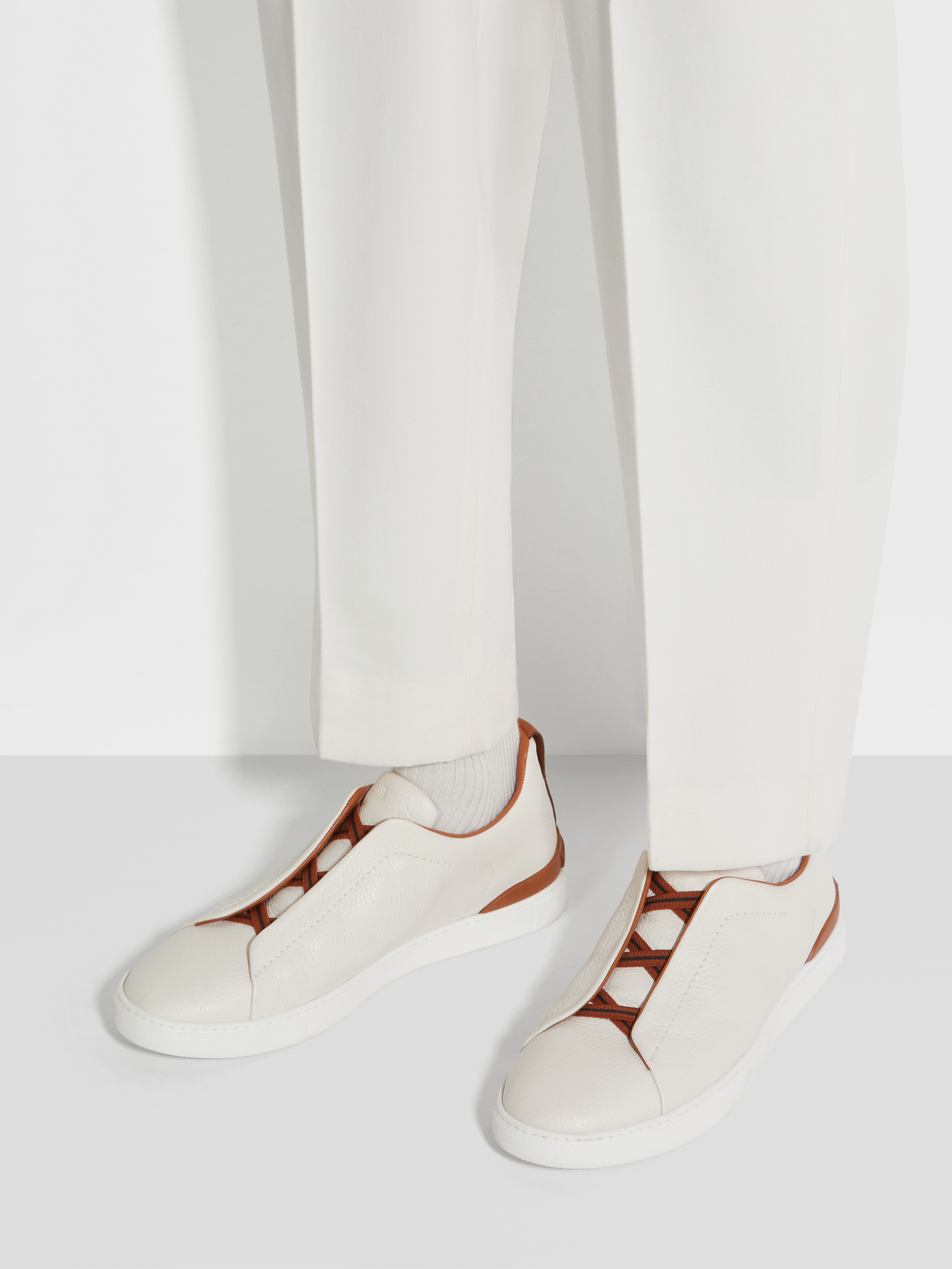 off white deerskin triple stitch sneakers