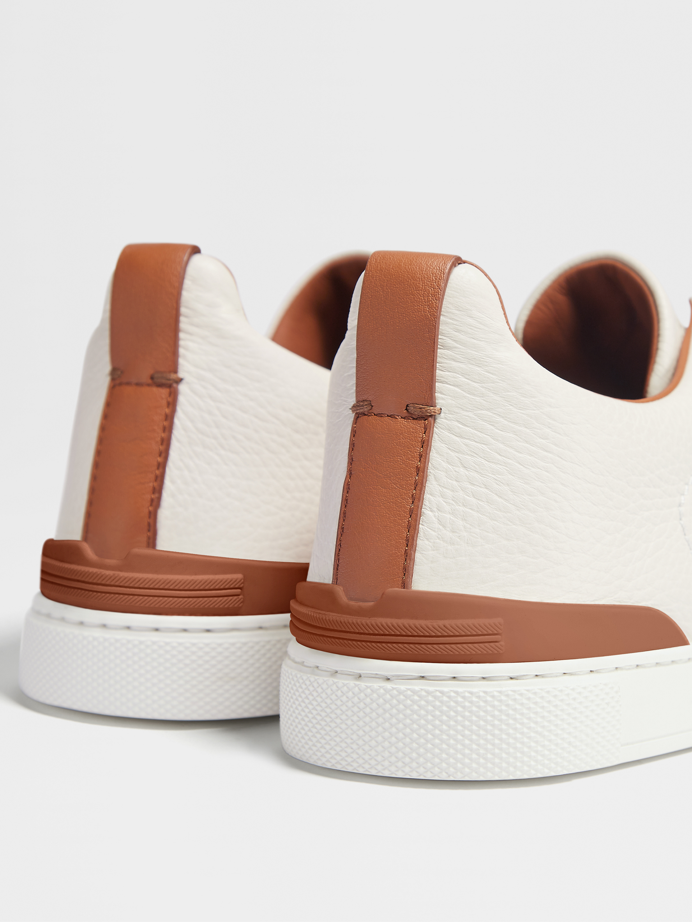 off white deerskin triple stitch sneakers