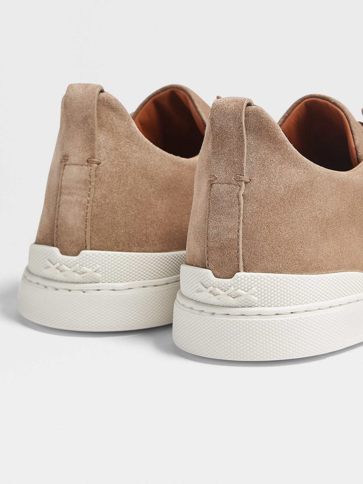 beige suede sneakers