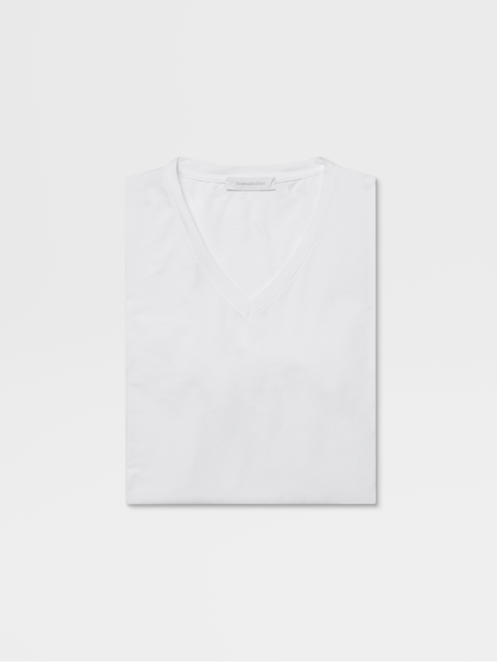 Camisa Blanca De Cuello En V Ss21 10367356 Zegna Una camisa blanca es una pieza basica del armario masculino que no puede faltar nunca entre tus esenciales. camisa blanca de cuello en v ss21