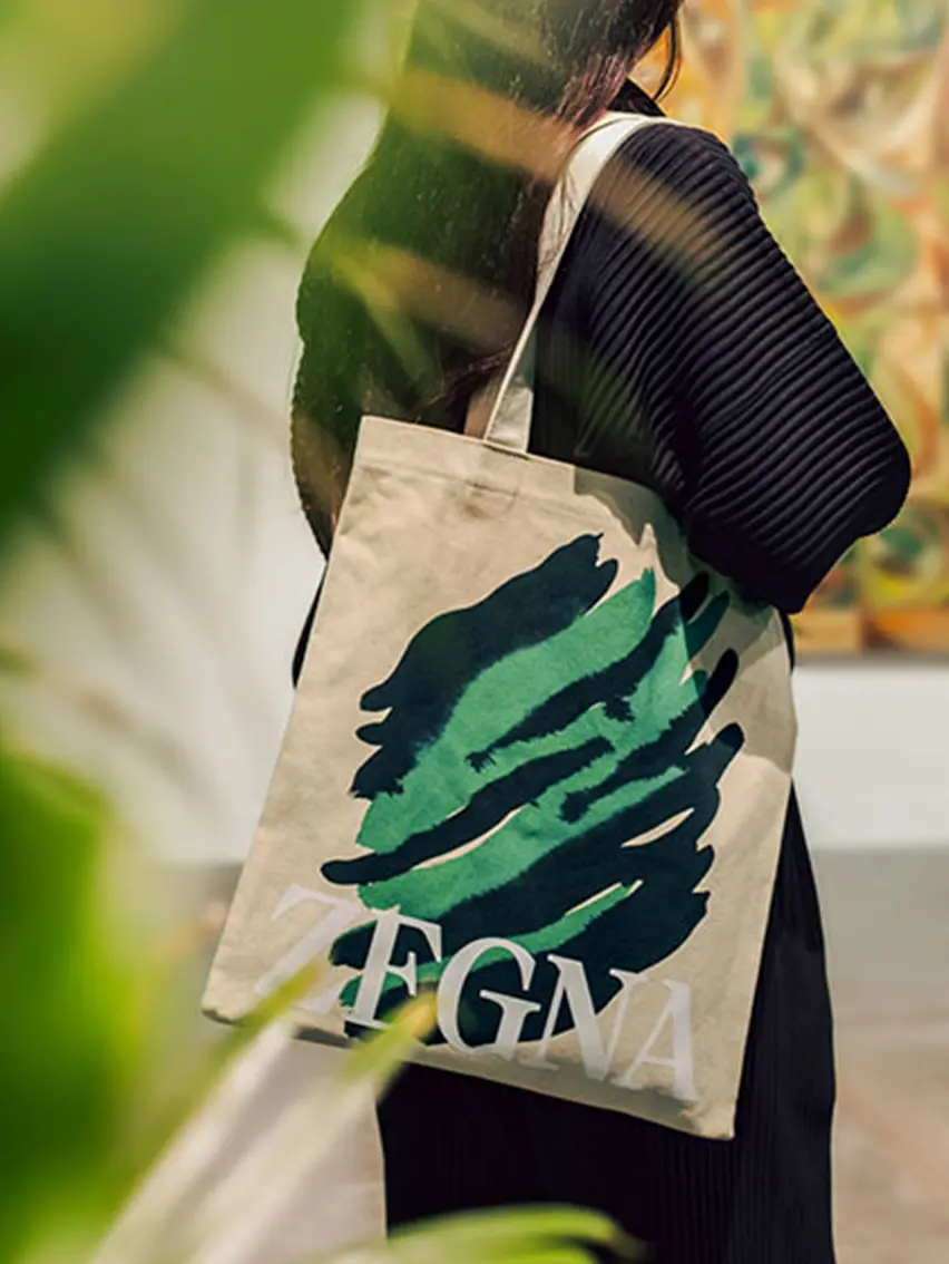 ZEGNA Art Basel tote bag carried by a visitor at the event.