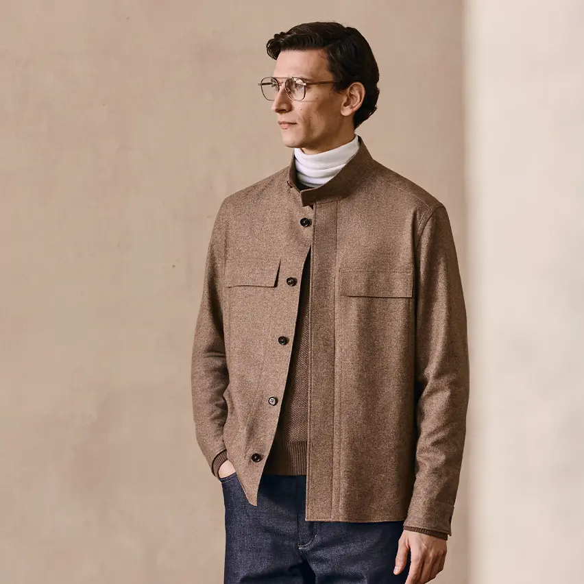 Eleganter Herrenlook mit einem Strick-Layer und einer Jacke aus der FW25 Kollektion von ZEGNA.