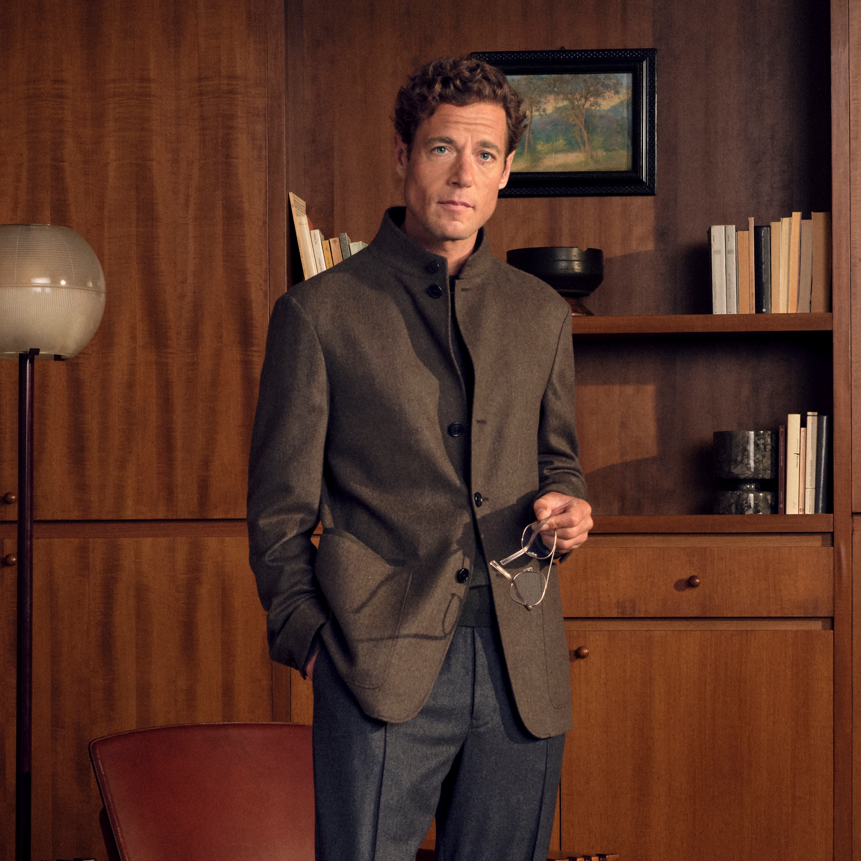 Man in an elegant refined look wearing the Oasi Cashmere Beaver Il Conte Chore Jacket over a Cashseta crew neck and cashmere pants in dark grey, from the ZEGNA Fall/Winter 2026 collection.