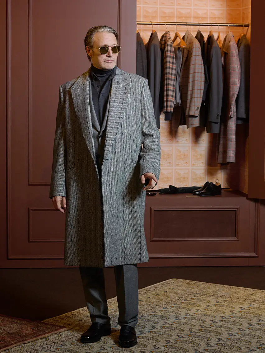 Mads Mikkelsen wearing a refined winter look at the ZEGNA Winter Fashion Show 2026.