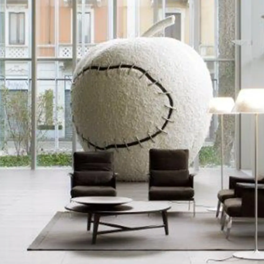 An apple placed inside the ZEGNA global headquarters, created by Michelangelo Pistoletto.