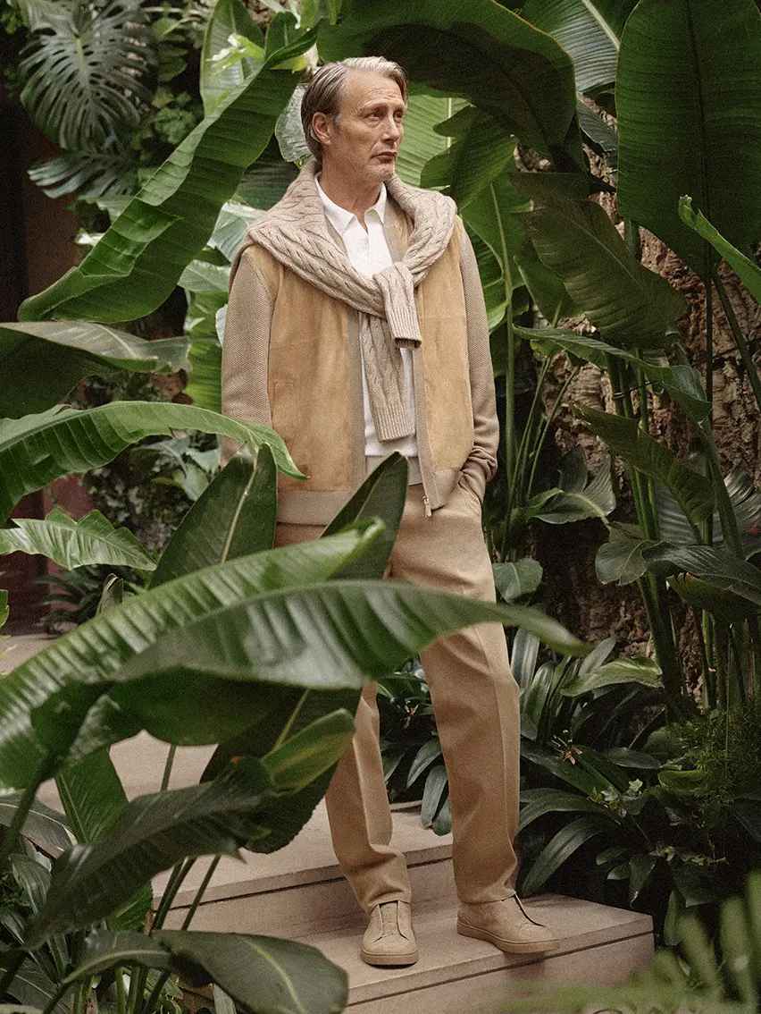 Mads Mikkelsen wearing a cashmere bomber and a lightweight knitwear crew neck from the ZEGNA SS26 collection.