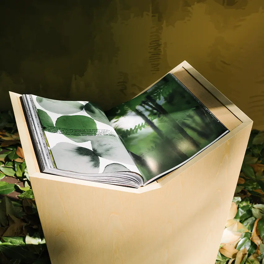 The Oasi Zegna book, published by Rizzoli New York, is opened on a table, revealing its middle pages.