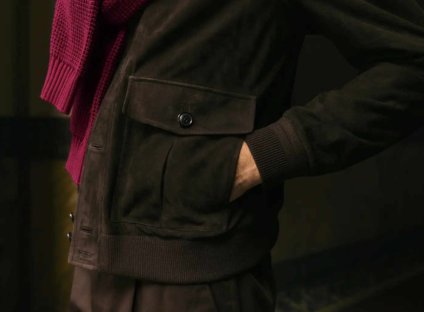 Close-up of a blouson with a ribbed stand collar and button closure, from ZEGNA SS26.