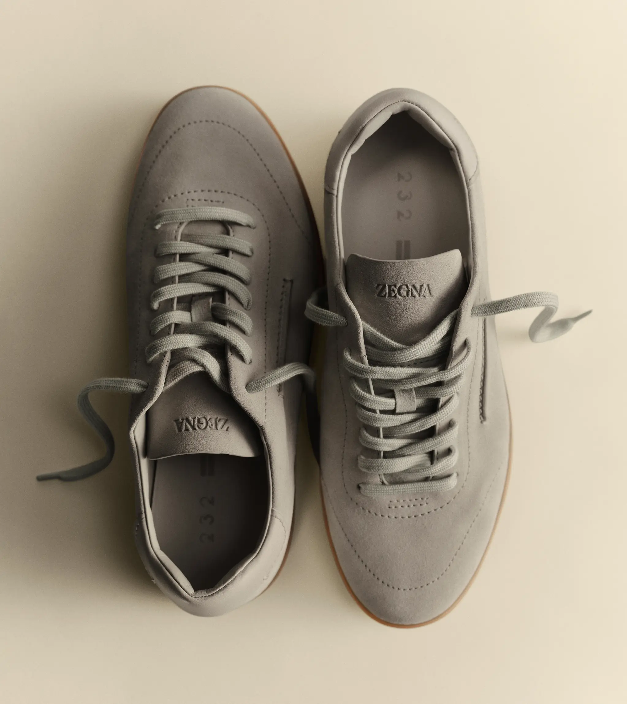 Top view of the ZEGNA 232 sneakers in Grey suede, from FW26 collection.