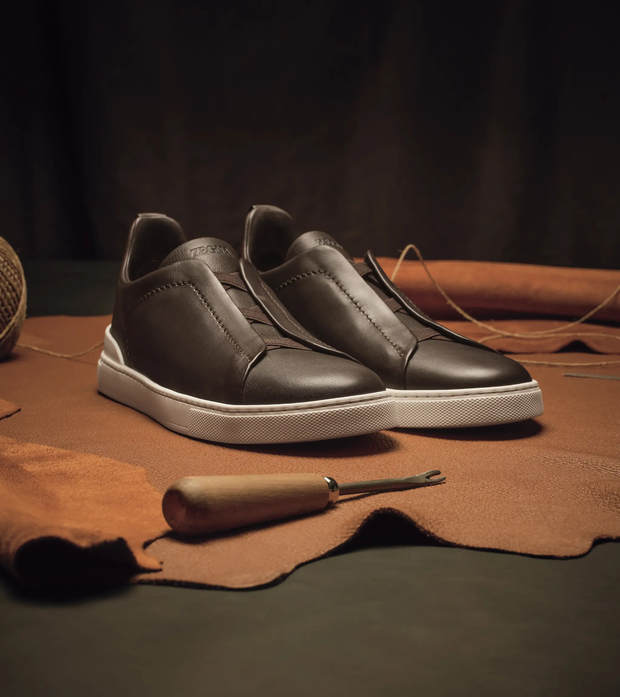 Men's Triple Stitch™ sneakers by ZEGNA in brown SECONDSKIN leather.