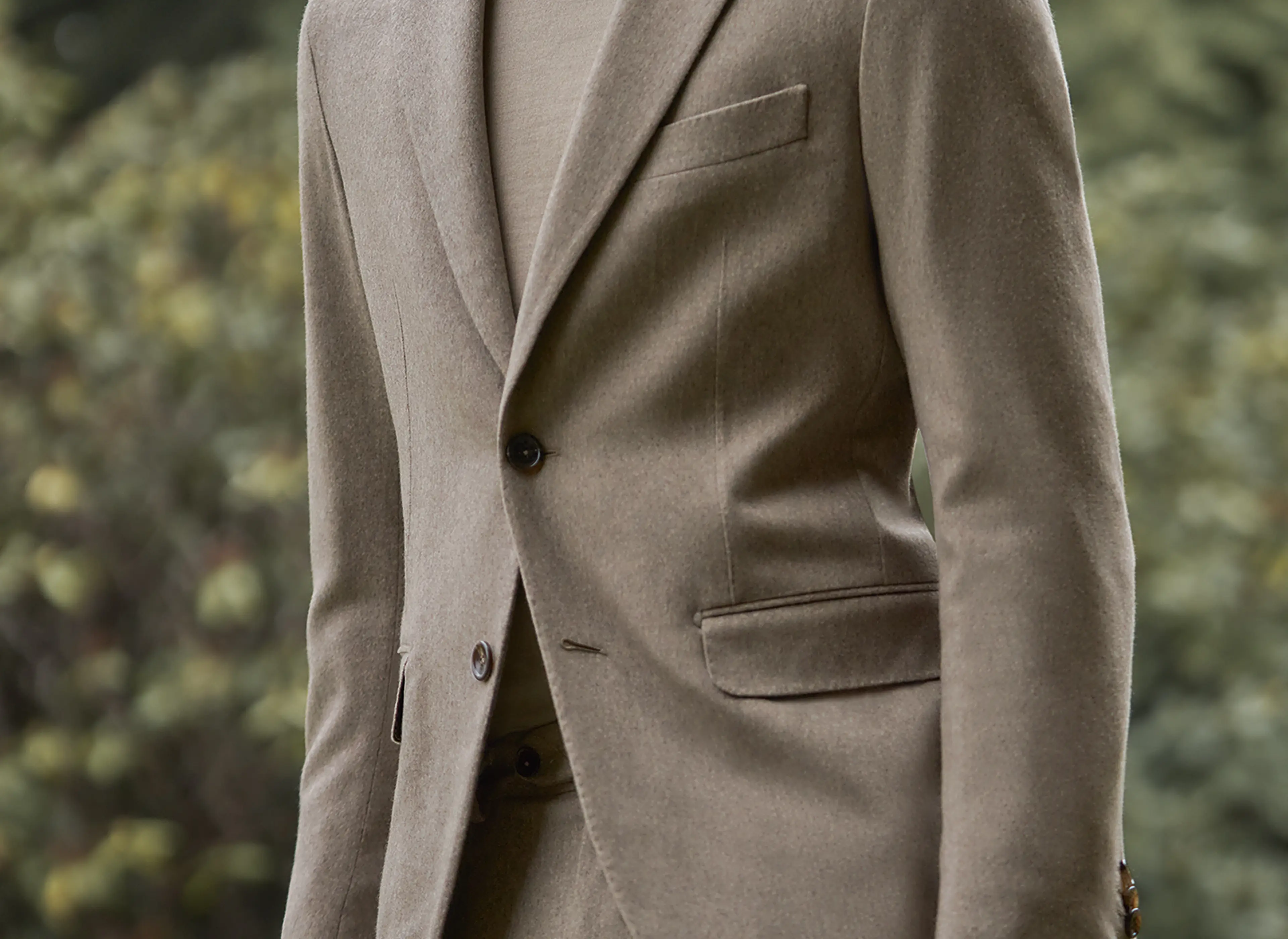 Man wearing a ZEGNA light cashmere suit with a turtleneck from the new fall/winter collection.