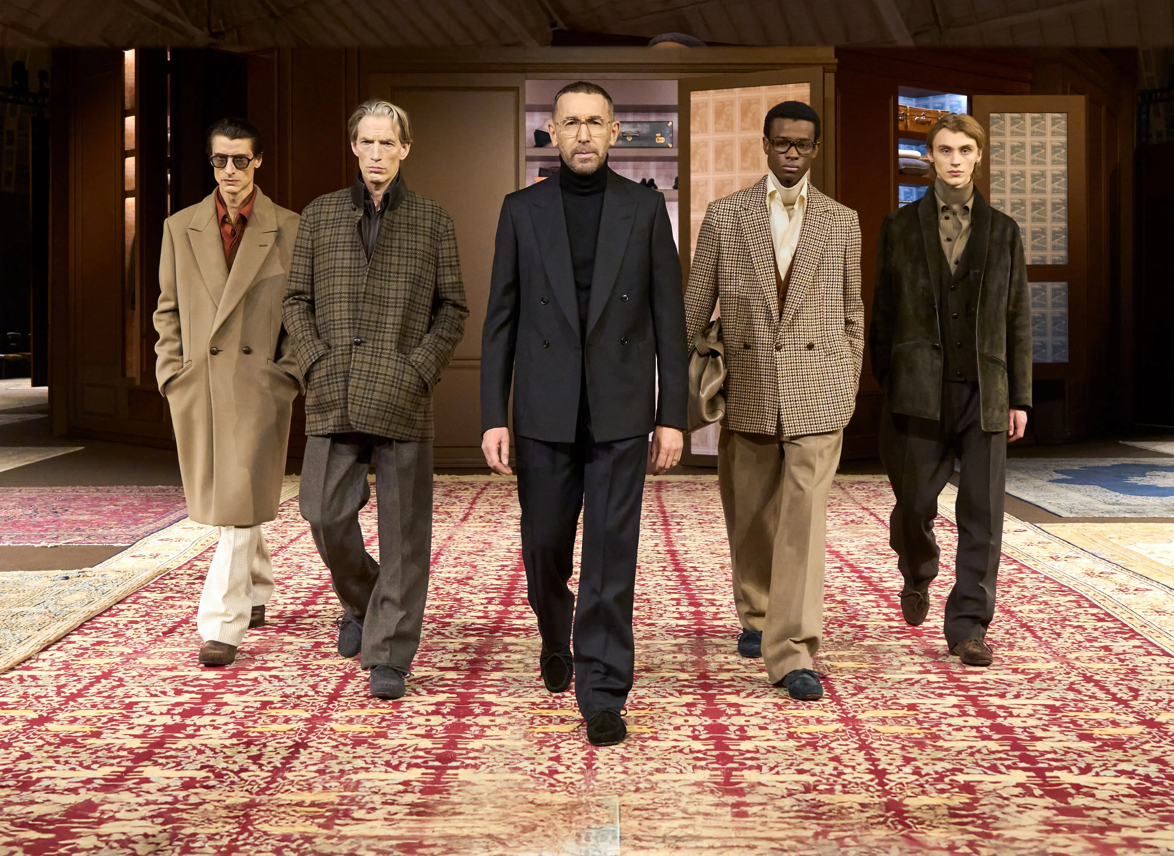 Alessandro Sartori, ZEGNA artistic director, with models on the runway during the ZEGNA Winter Fashion Show 2026.