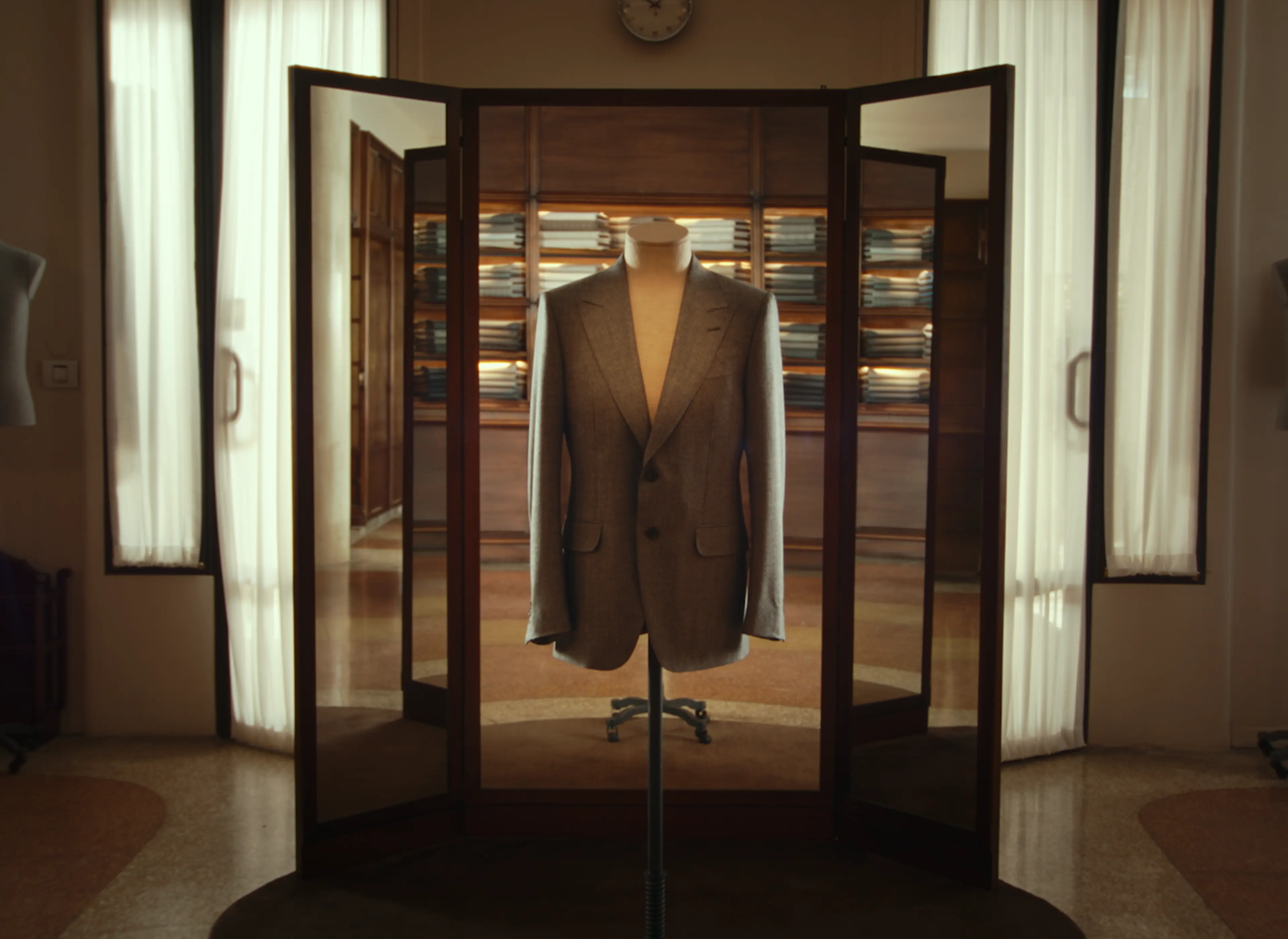 Tailored jacket displayed at a ZEGNA atelier.