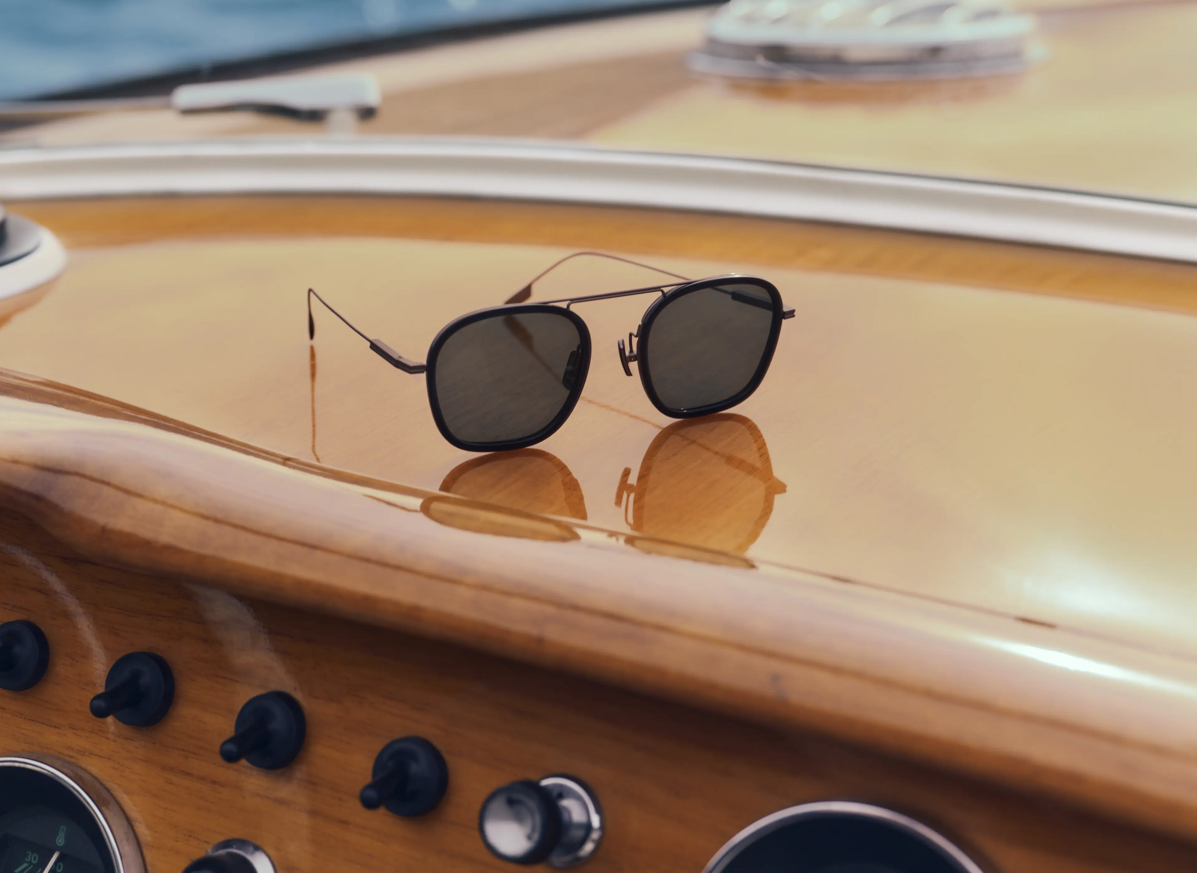 ZEGNA sunglasses from the Spring Summer 2026 collection with boat background.