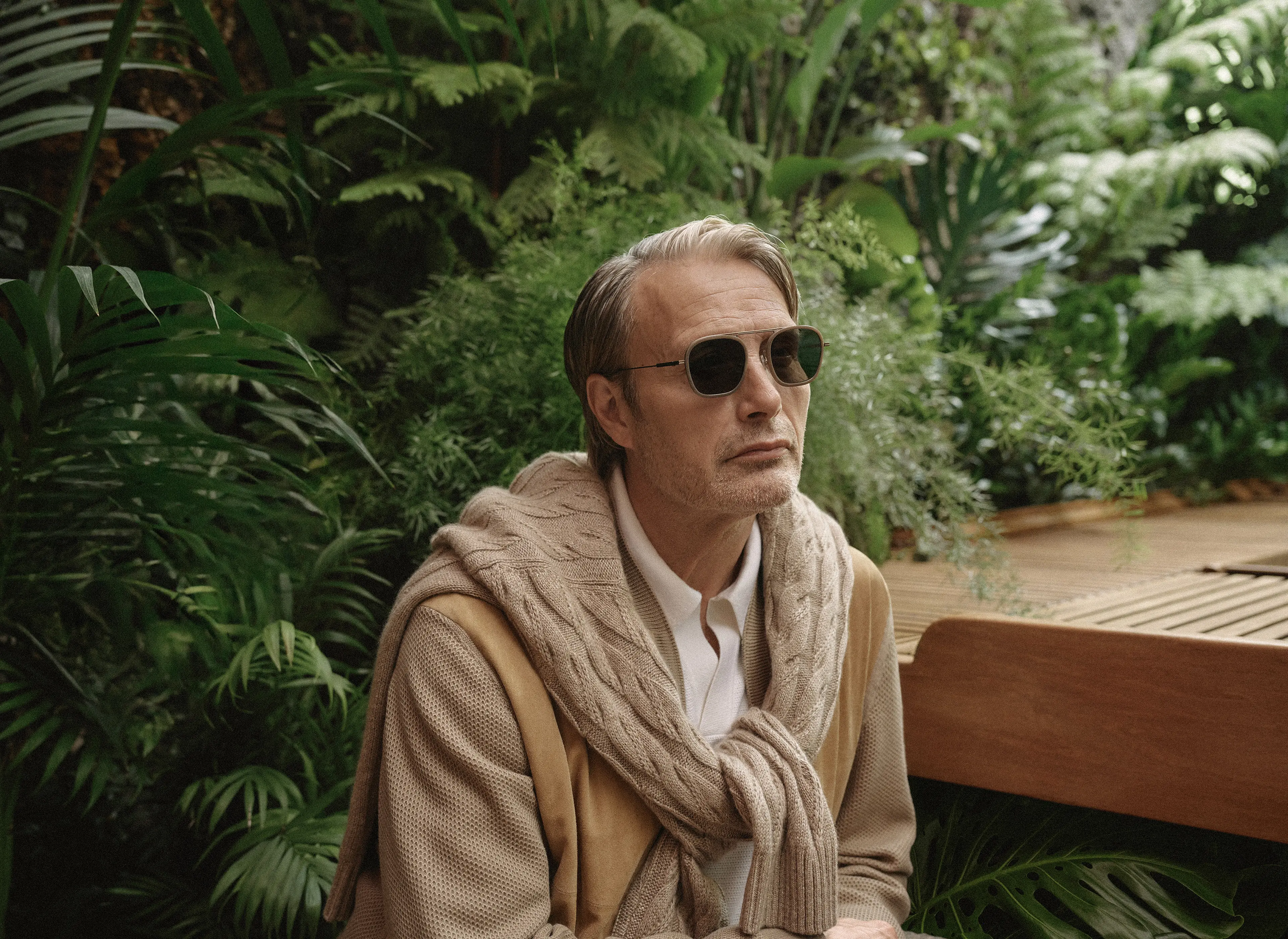 Mads Mikkelsen wearing a cashmere bomber, lightweight knitwear crew neck and sunglasses from the ZEGNA SS26 collection.