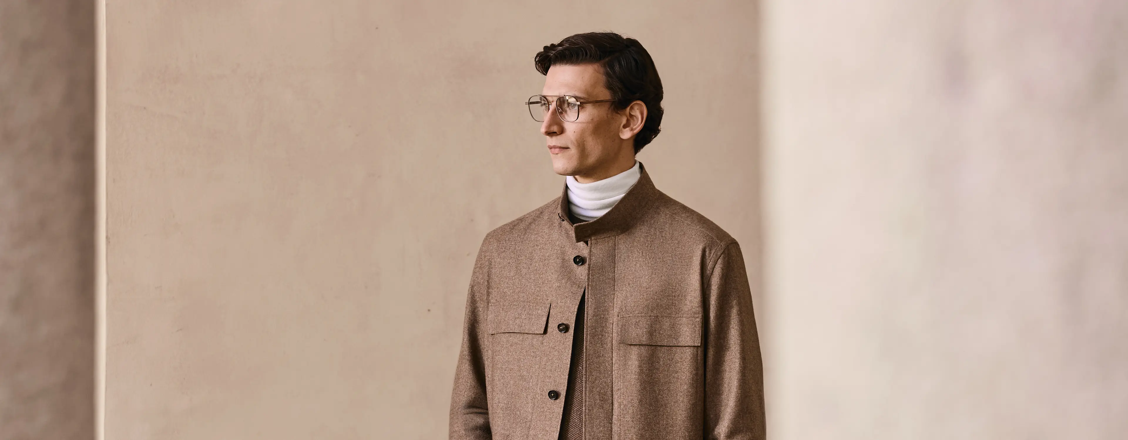 Tailored menswear look with layered knitwear and jacket, from the ZEGNA FW25 collection.