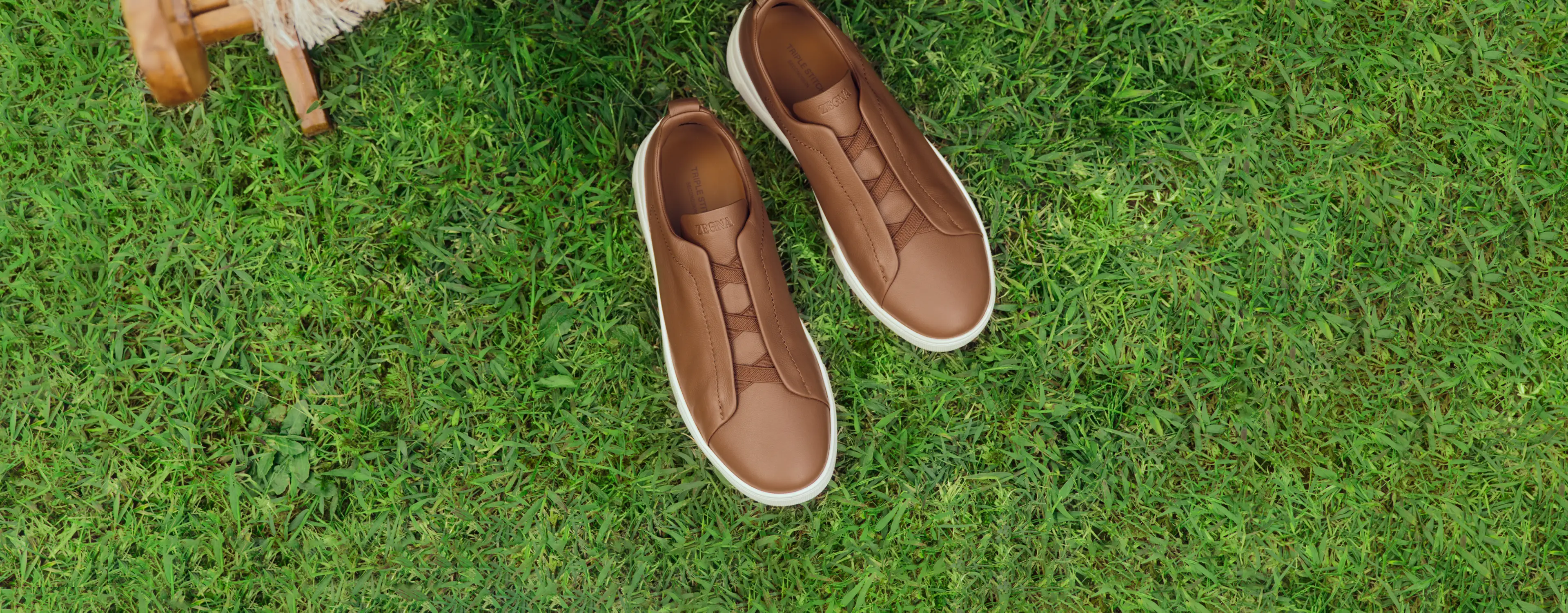 ZEGNA Triple Stitch second skin espadrillas and beach towel from the Spring Summer 2026 collection with boat background