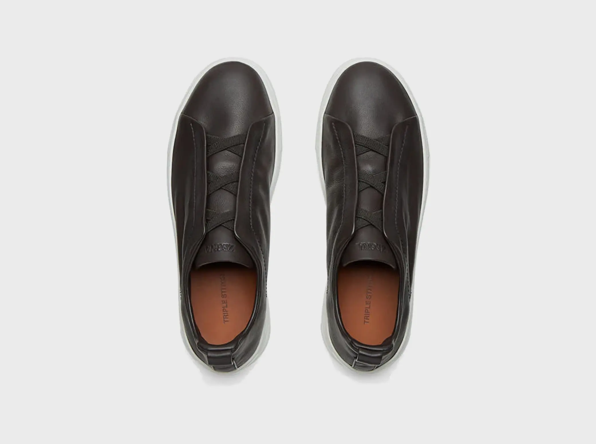 The SECONDSKIN Triple Stitch™ sneakers mold to your foot for the perfect fit.