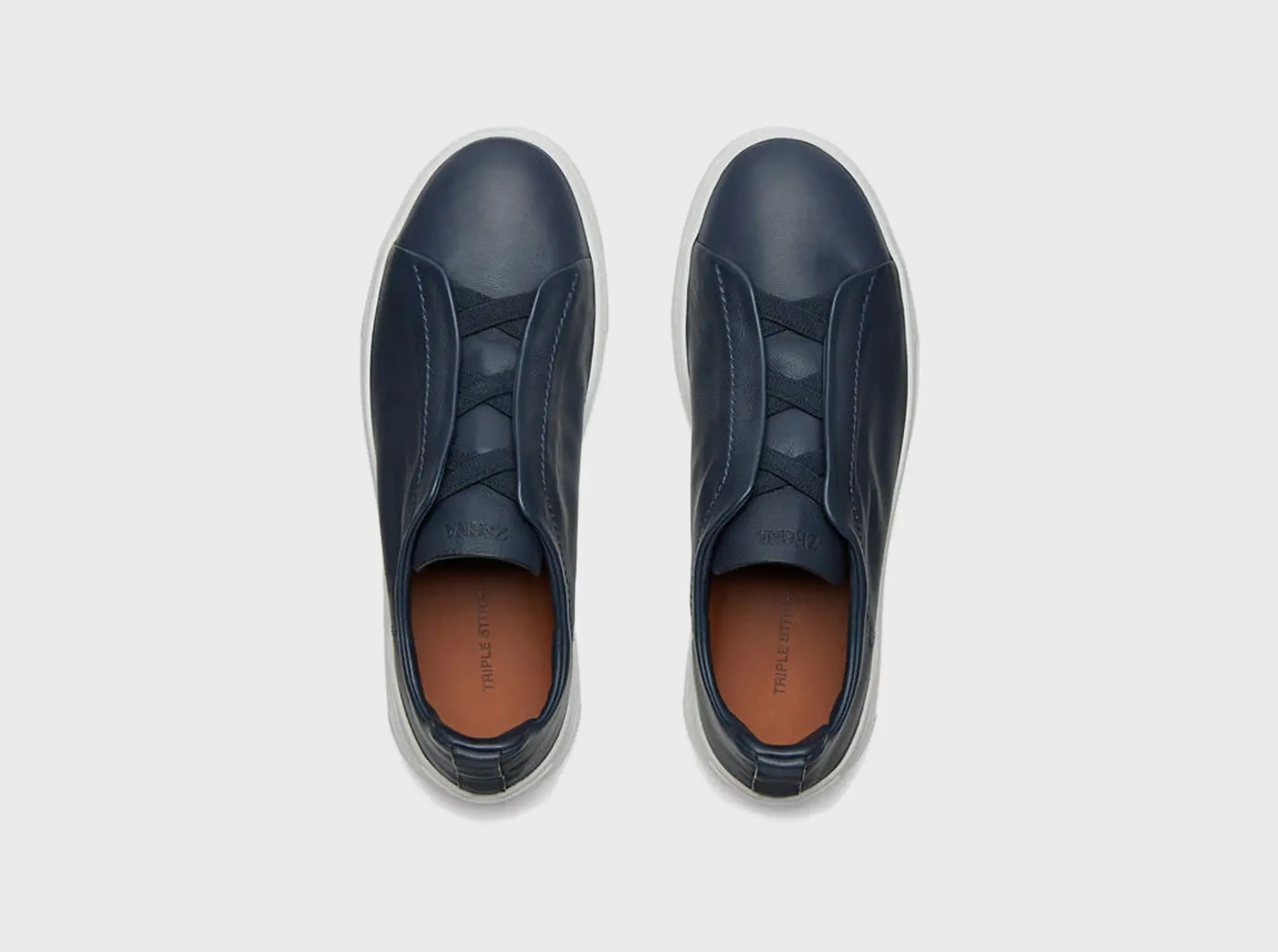 The SECONDSKIN Triple Stitch™ sneakers mold to your foot for the perfect fit.