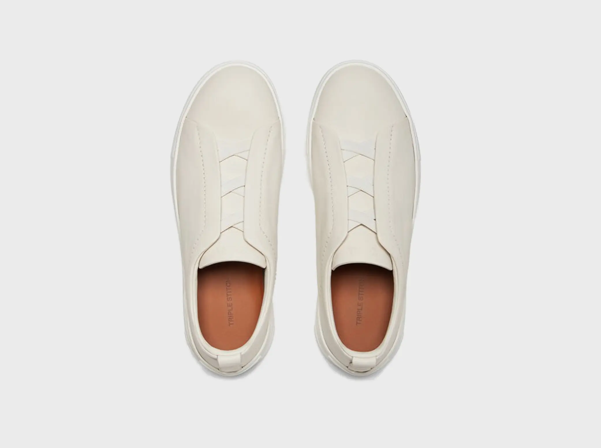 The SECONDSKIN Triple Stitch™ sneakers mold to your foot for the perfect fit.