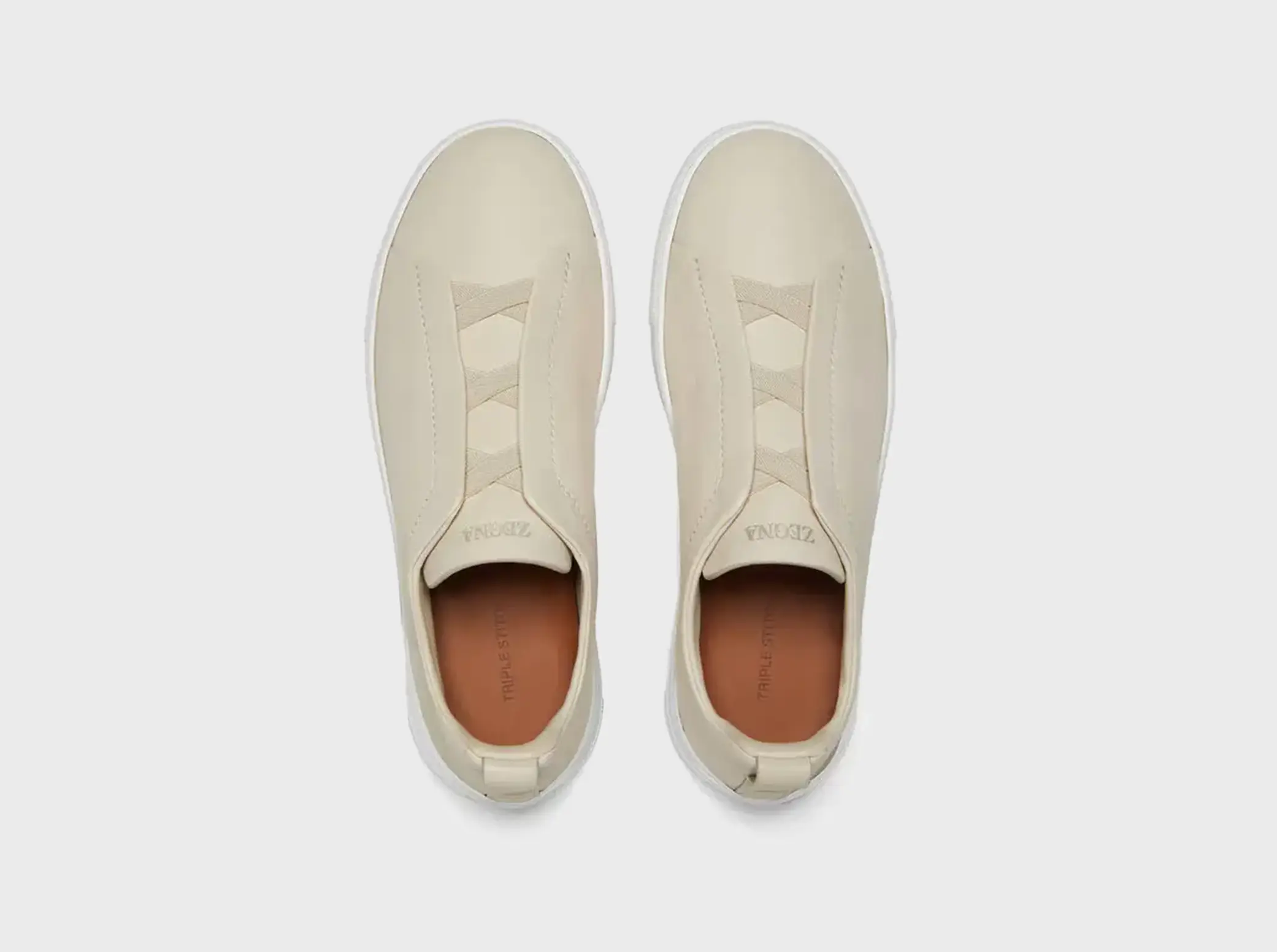 The SECONDSKIN Triple Stitch™ sneakers mold to your foot for the perfect fit.