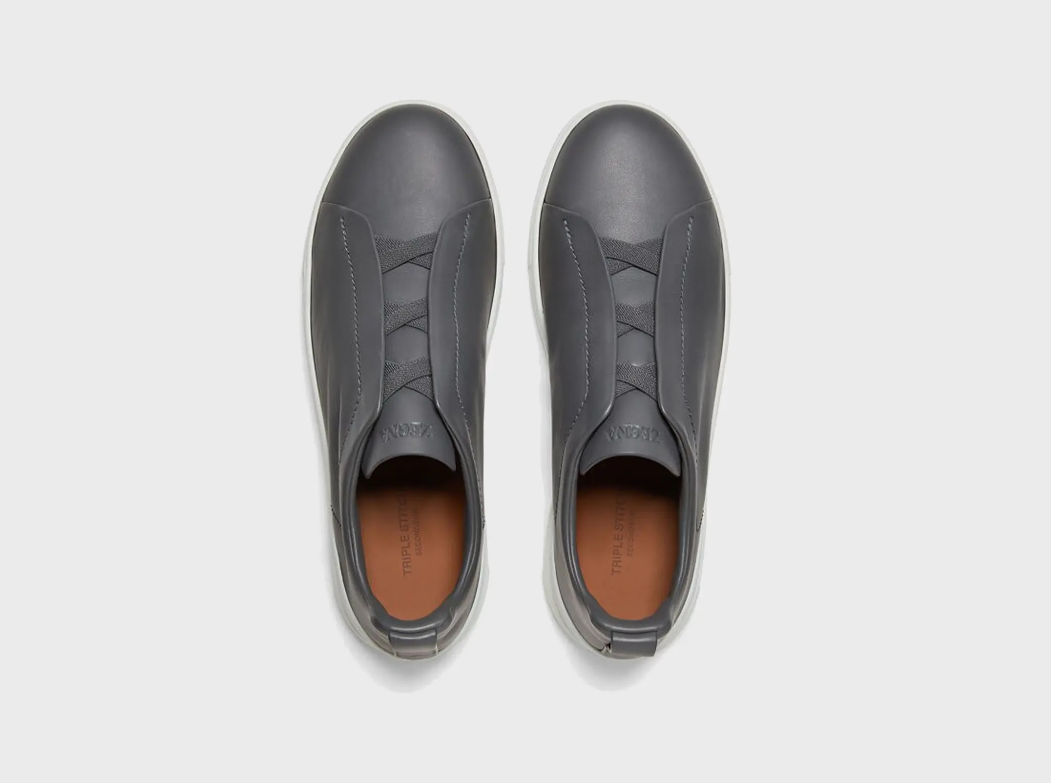 The SECONDSKIN Triple Stitch™ sneakers mold to your foot for the perfect fit.