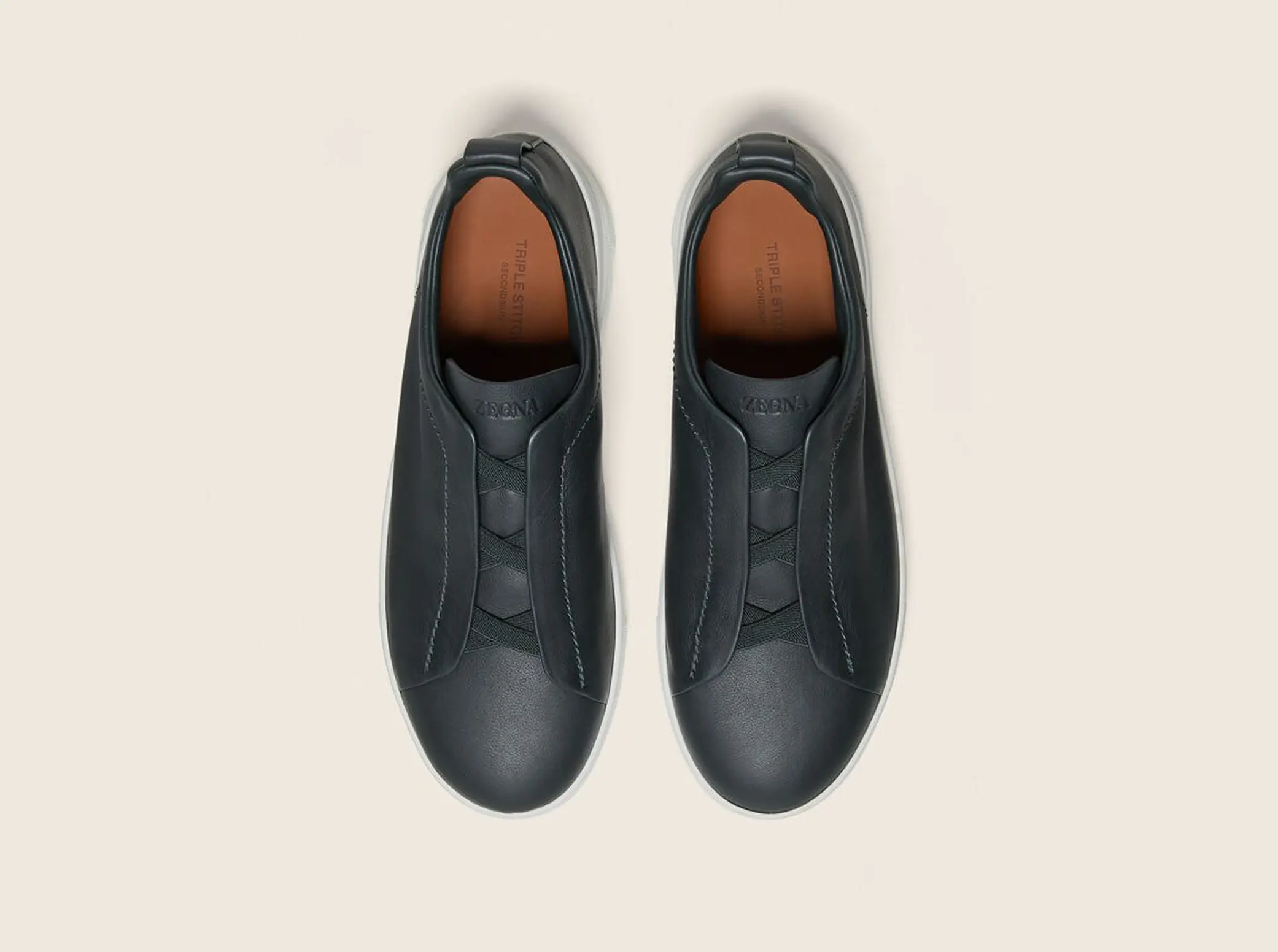 The SECONDSKIN Triple Stitch™ sneakers mold to your foot for the perfect fit.