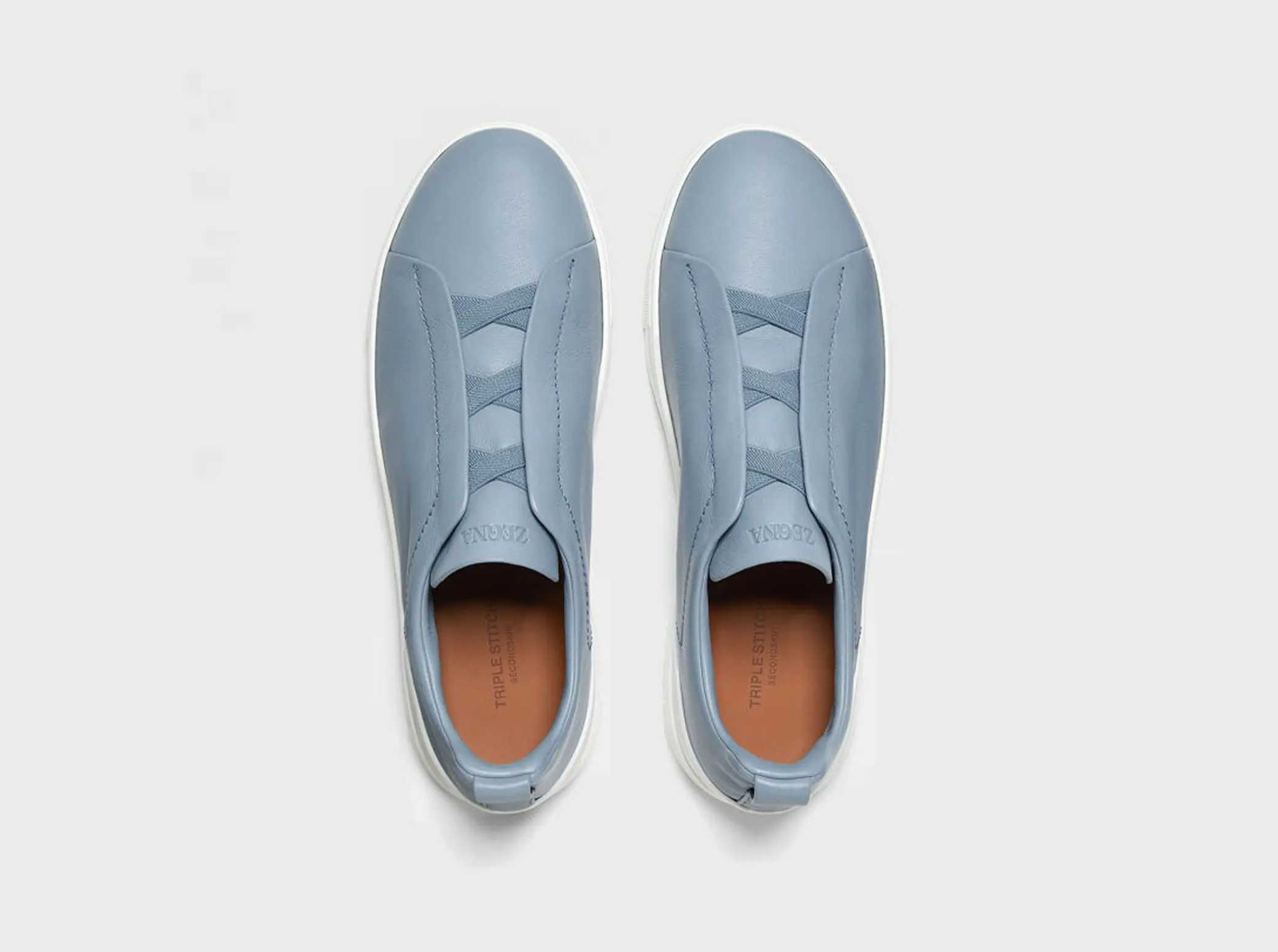 The SECONDSKIN Triple Stitch™ sneakers mold to your foot for the perfect fit.