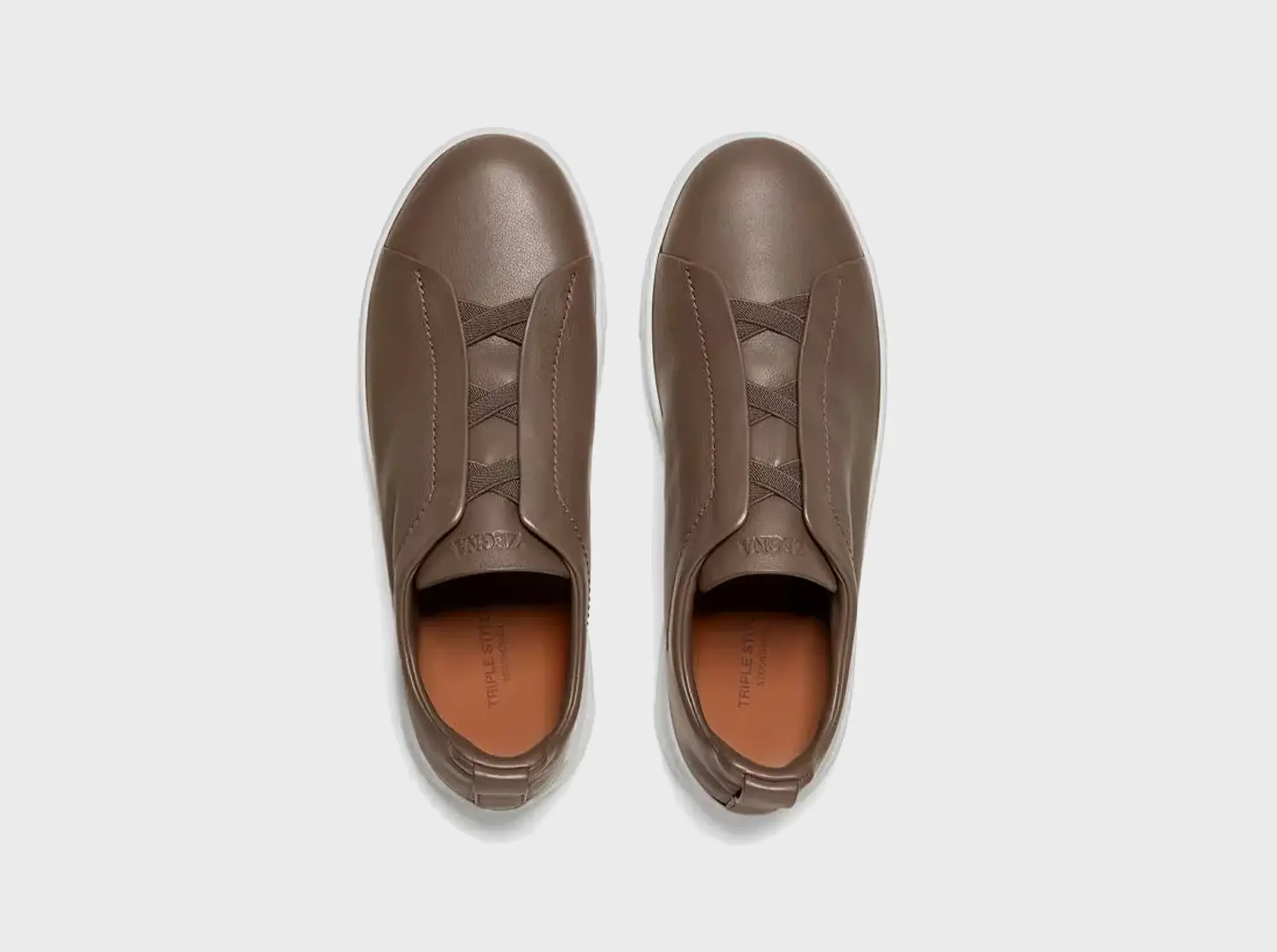 The SECONDSKIN Triple Stitch™ sneakers mold to your foot for the perfect fit.