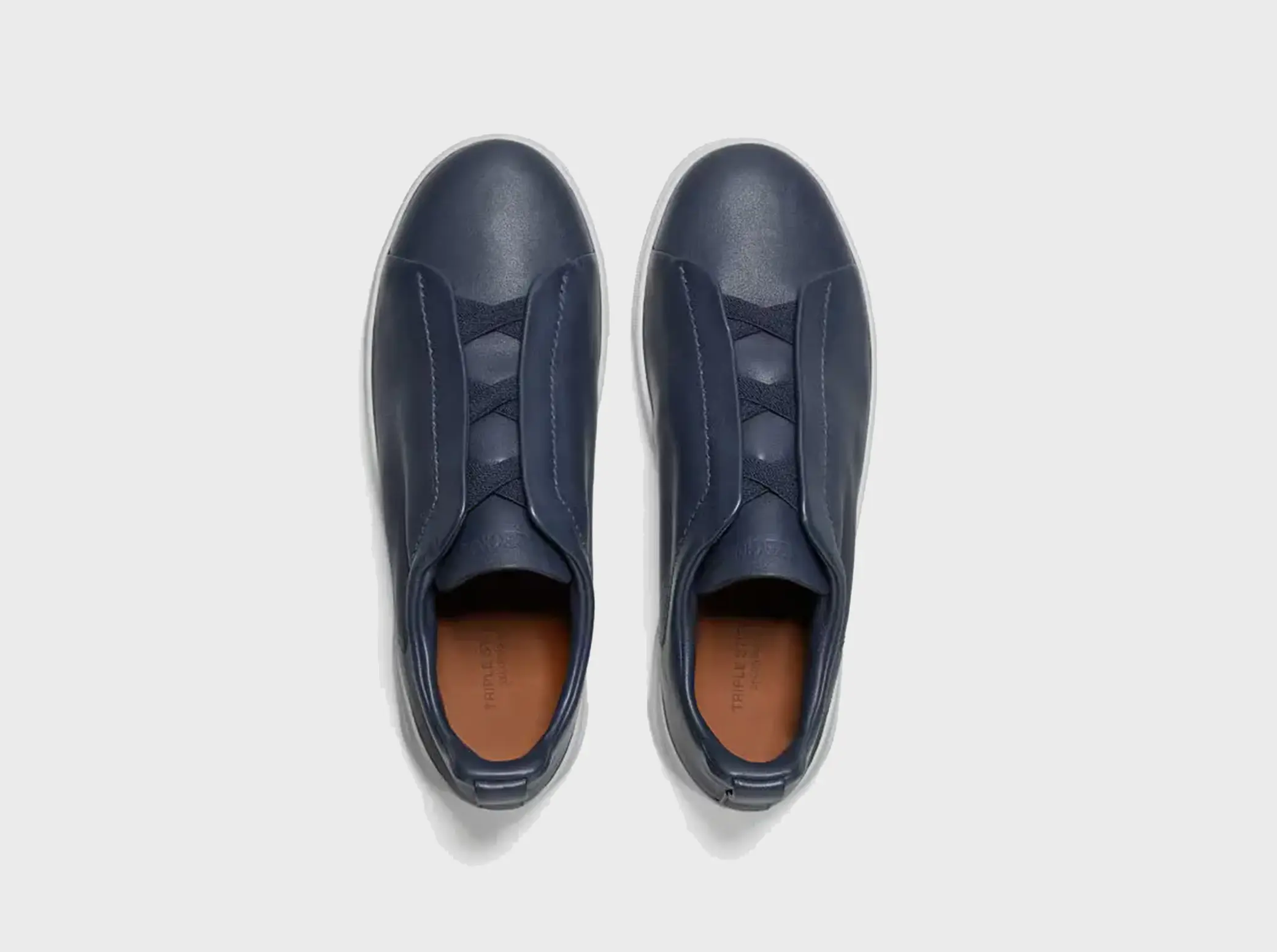 The SECONDSKIN Triple Stitch™ sneakers mold to your foot for the perfect fit.