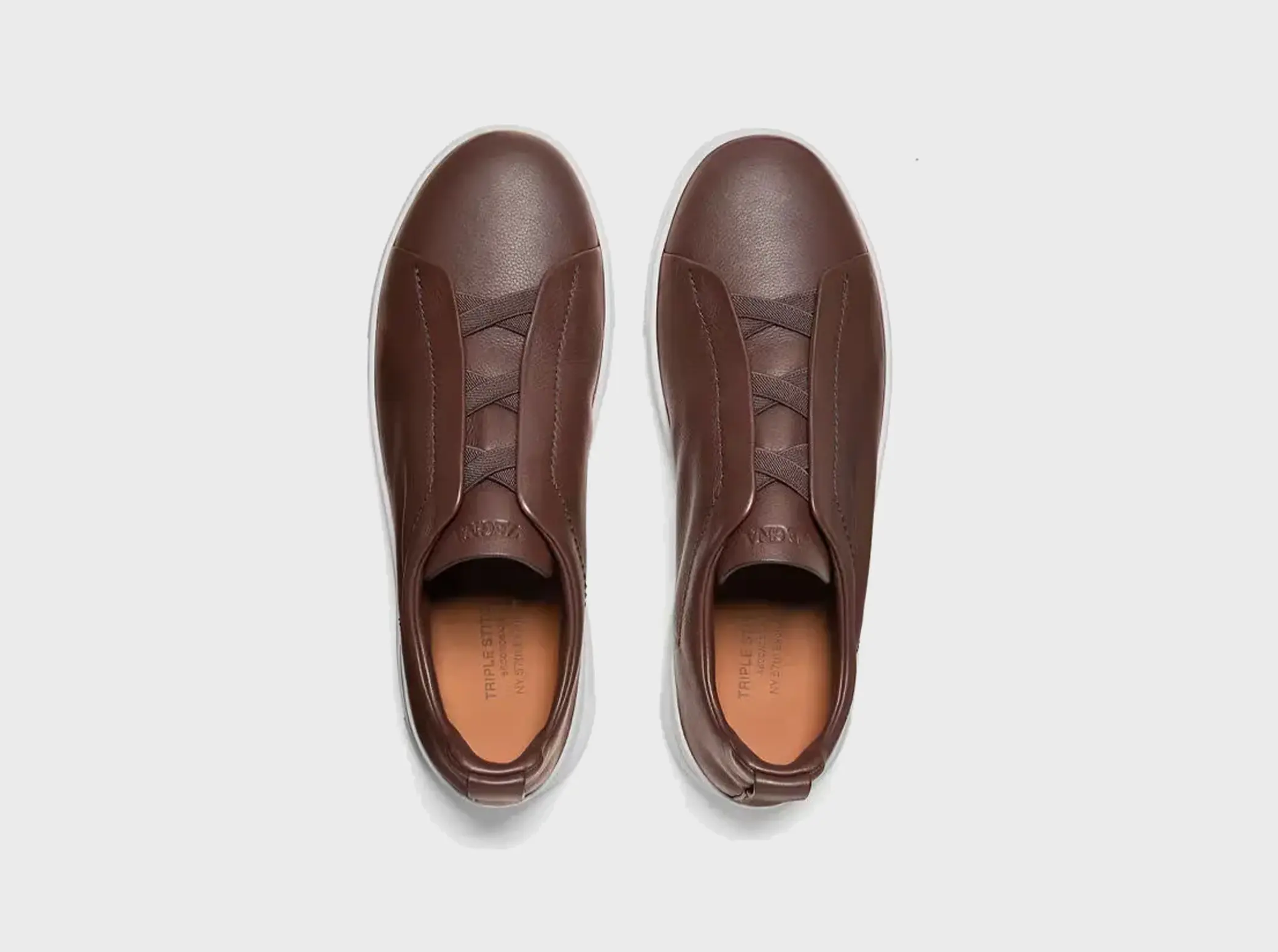 The SECONDSKIN Triple Stitch™ sneakers mold to your foot for the perfect fit.